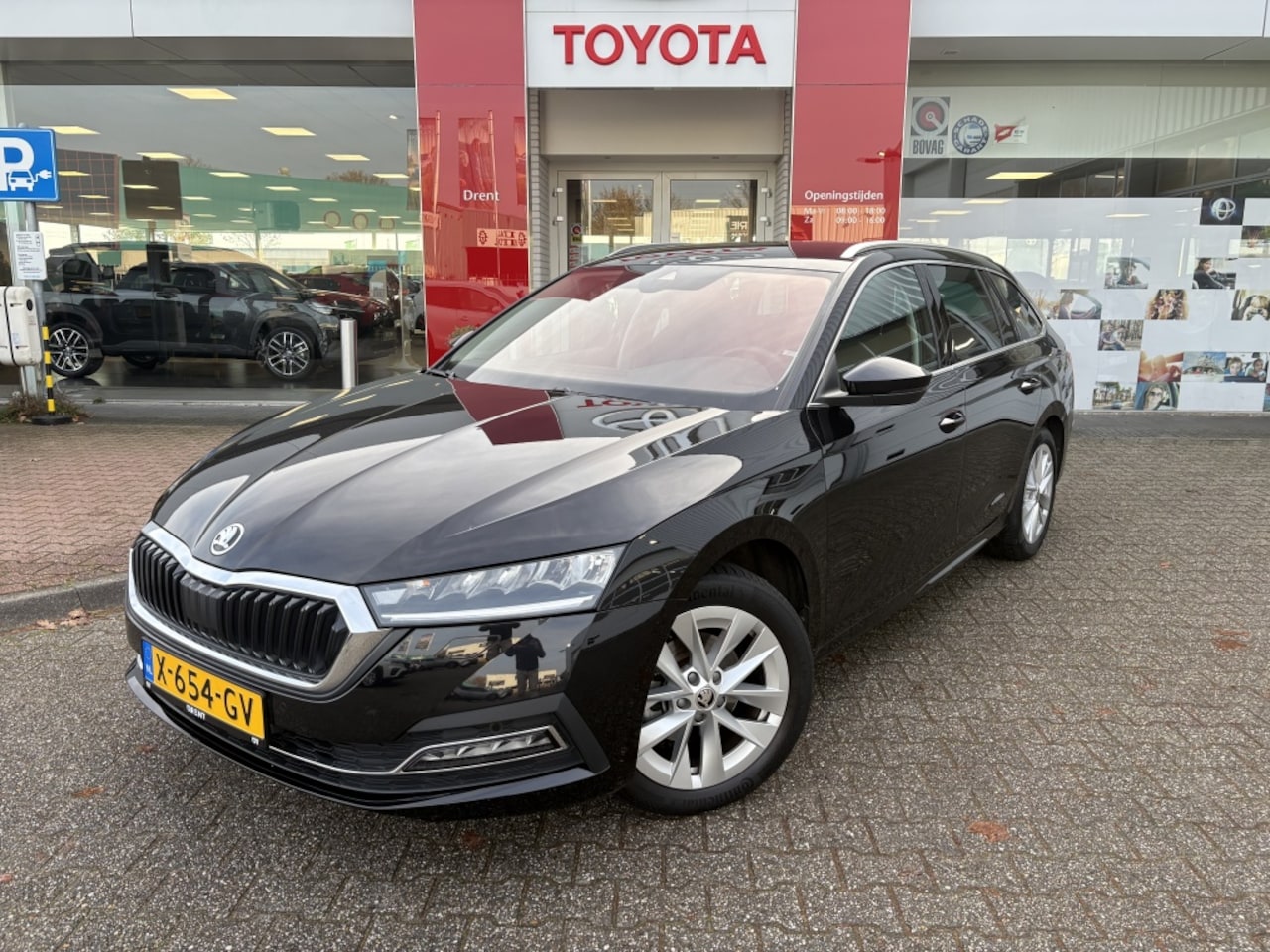 Skoda Octavia Combi - 1.0 e-TSI Business Edition Plus | Trekhaak | Stoelverwarmi - AutoWereld.nl