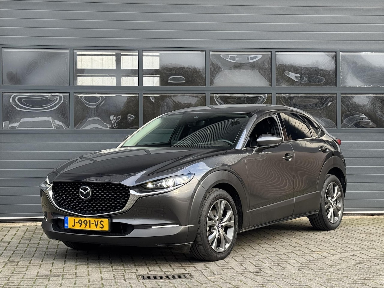 Mazda CX-30 - 2.0 E-SKYACTIV M HYBRID LUXURY I AUTOMAAT I P-CAMERA I CLIMATE CONTROL I APPLE CARPLAY I L - AutoWereld.nl