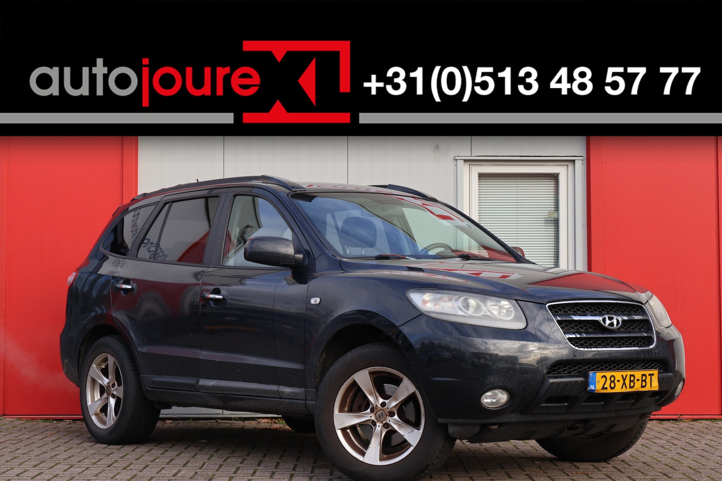 Hyundai Santa Fe - 2.7i V6 Style 7p. | Origineel NL | Climate Control | Leder | Cruise Control | Trekhaak | - AutoWereld.nl