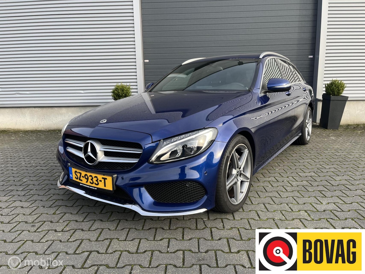 Mercedes-Benz C-klasse Estate - 180 AMG | Leder | Camera | Trekhaak - AutoWereld.nl