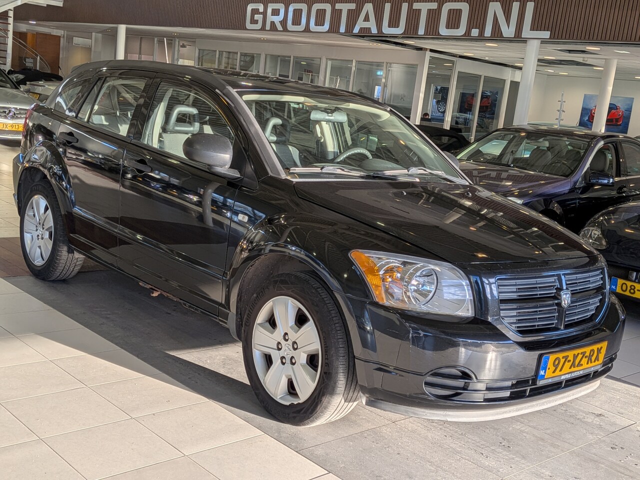 Dodge Caliber - 1.8 SE Airco, Elektr. Schuif-/Kanteldak, Stuurbekrachtiging - AutoWereld.nl