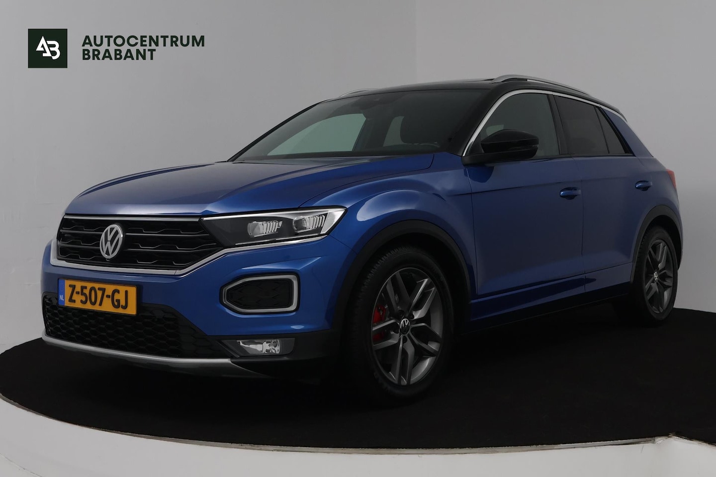 Volkswagen T-Roc - 1.5 TSI Sport Business R (PANORAMADAK, STOEL/STUUR VERWARMING, DIGITALE COCKPIT, ACHTERUIT - AutoWereld.nl