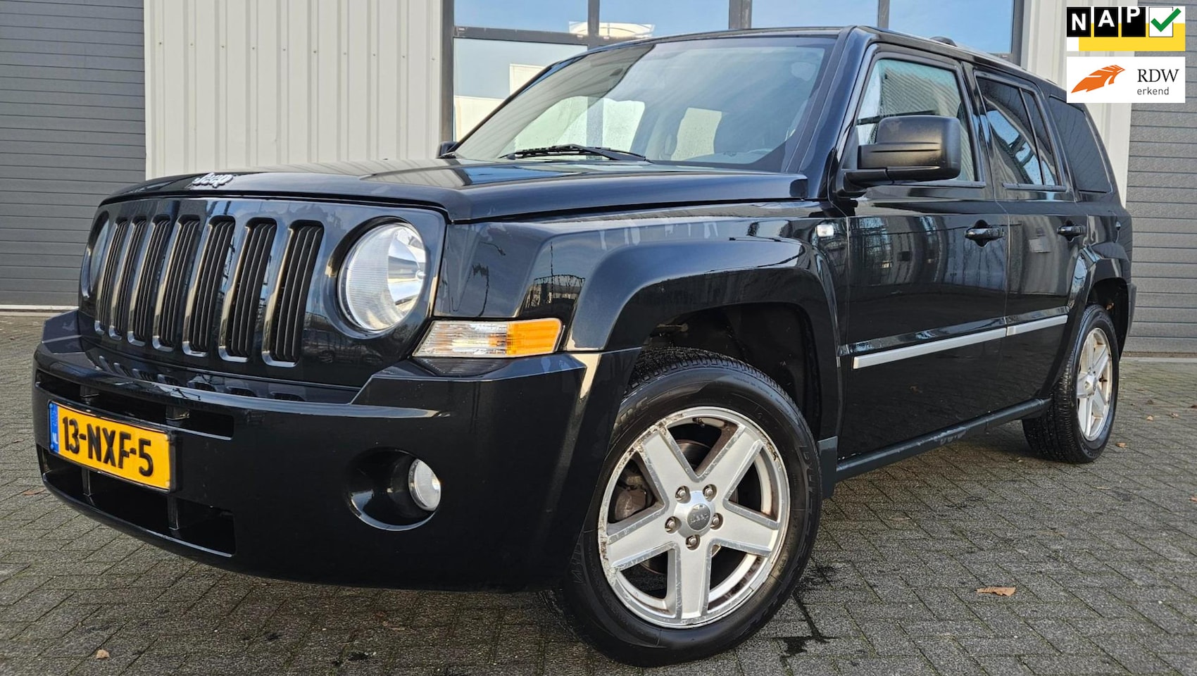 Jeep Patriot - 2.4 Limited Liberty AUTOMAAT Clima Cruise Trekhaak NAP! - AutoWereld.nl