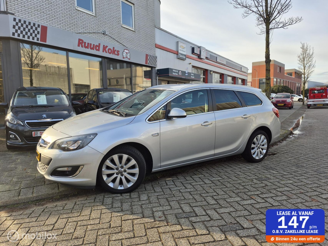 Opel Astra Sports Tourer - 1.4 BLITZ / Navigatie / - AutoWereld.nl