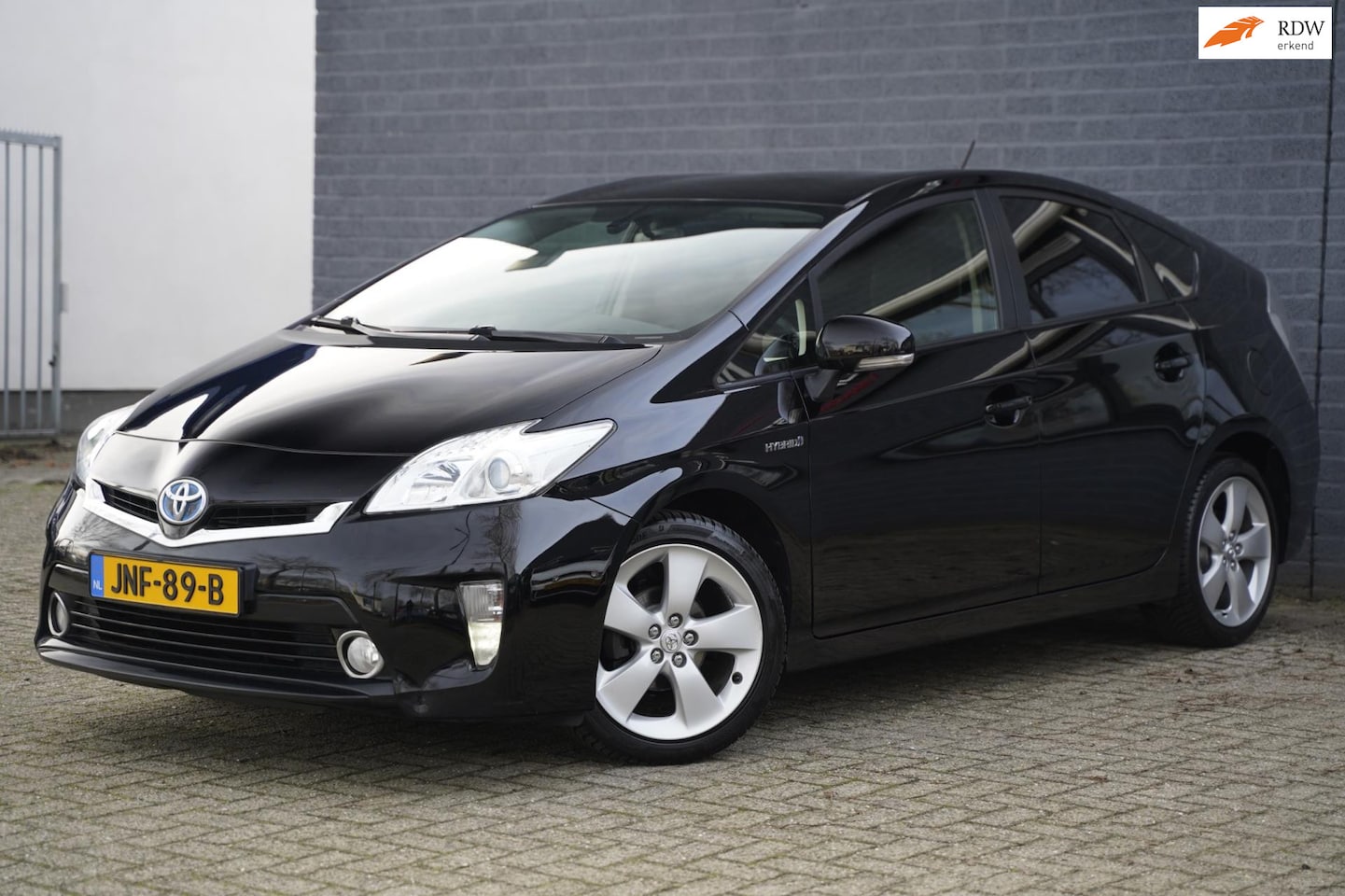 Toyota Prius - 1.8 Life Hybrid, Leder, Navigatie, Camera - AutoWereld.nl