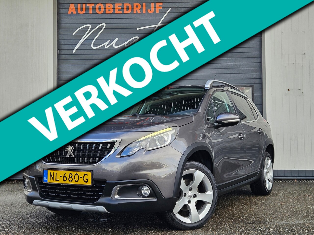 Peugeot 2008 - 1.2 PureTech Allure|Leer|Navi|Clima|Trekhaak - AutoWereld.nl