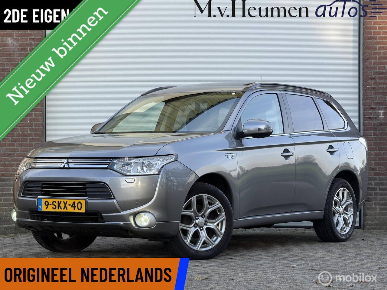 Mitsubishi Outlander - 2.0 PHEV Intense + Adaptive Cruise Schuif/kanteldak Leder Camera Trekhaak - AutoWereld.nl