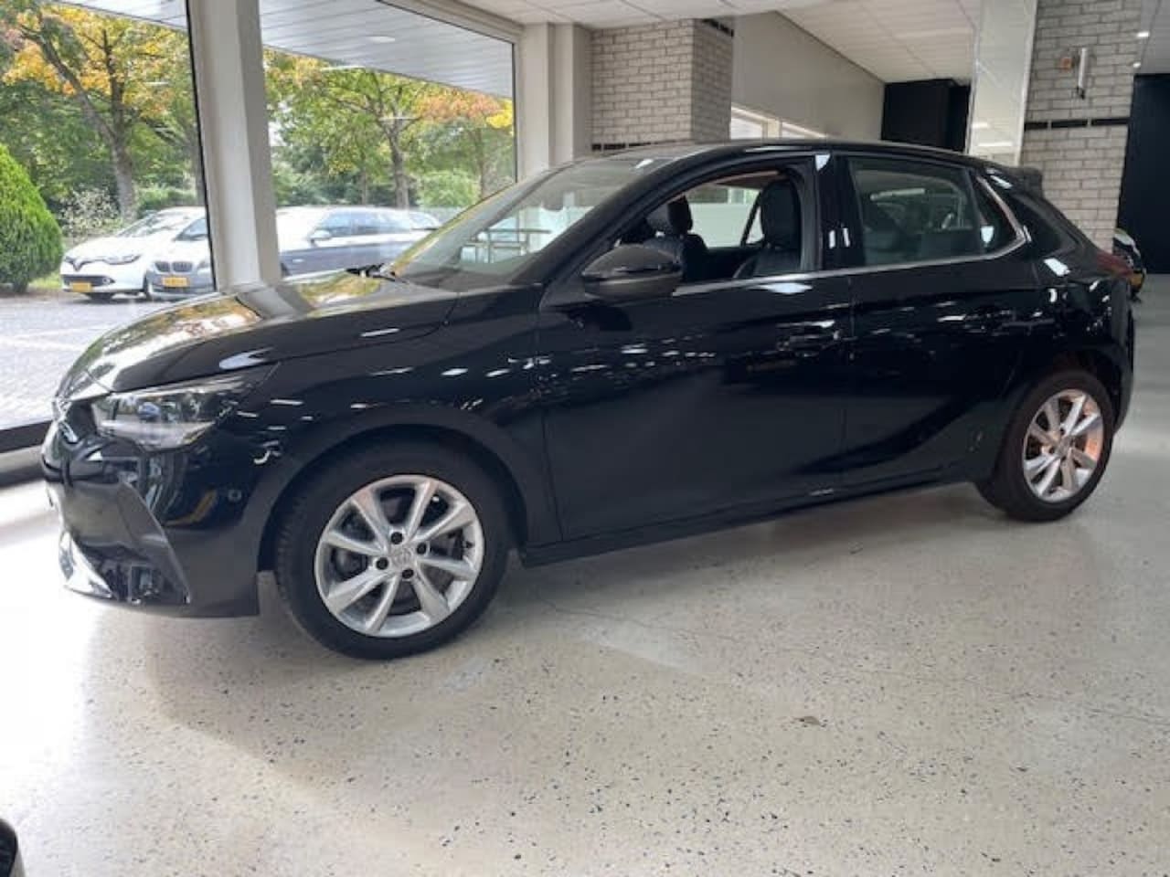 Opel Corsa - 1.2 T Automaat Winterpakket Navigatie app Airco PDC Leder Half - AutoWereld.nl