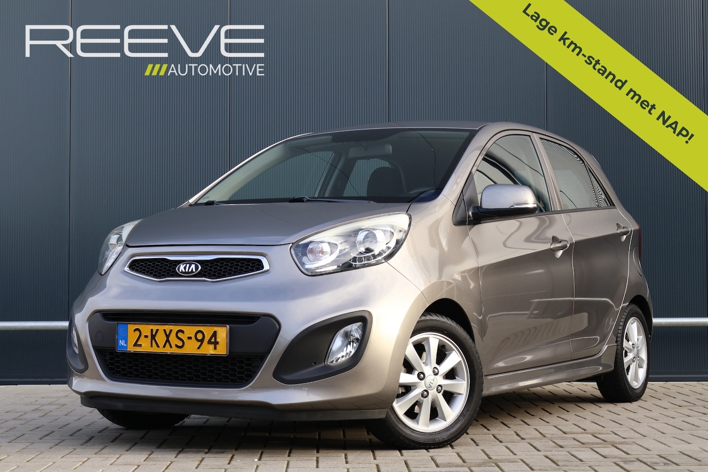 Kia Picanto - 1.2 CVVT Plus Pack 86pk | Lage km-stand! | Afneembare Trekhaak | Airco | Elektrische ramen - AutoWereld.nl