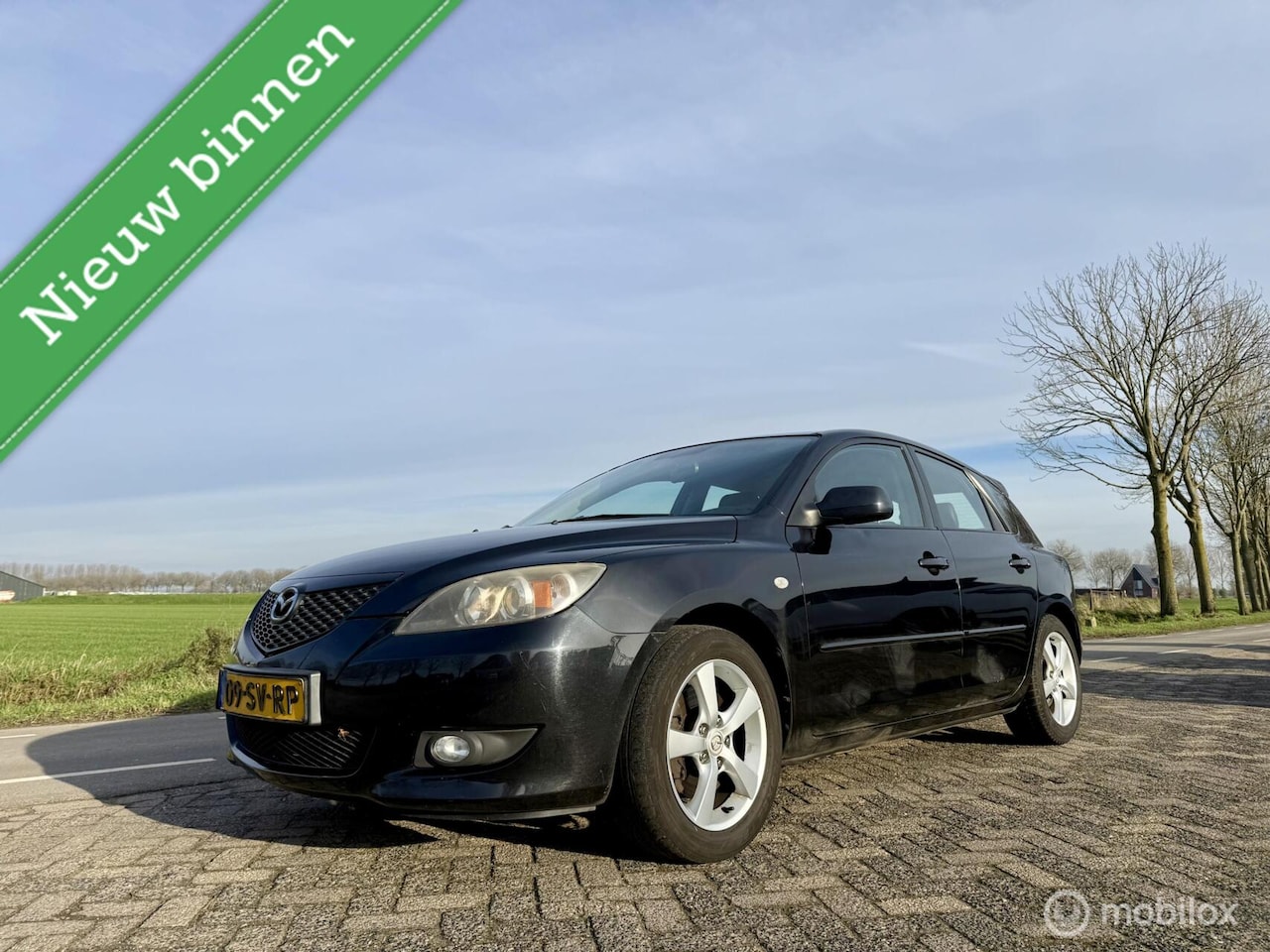 Mazda 3 Sport - 2.0 Active Sportline 2.0 Active Sportline, BJ 2006, Airco, Leer - AutoWereld.nl