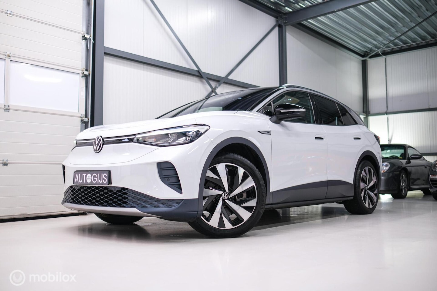 Volkswagen ID.4 - First 77 kWh | Nieuwe ACCU | Trekhaak | Camera | 20 inch | NL auto | Stoel + stuurwiel ver - AutoWereld.nl