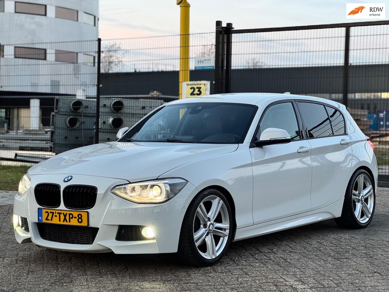 BMW 1-serie - 118i Business+|M PAKKET|AUT|NAVI|PSENSOR|LEDER| - AutoWereld.nl