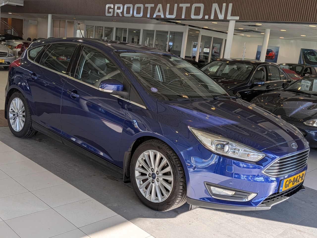 Ford Focus - 1.5 Titanium Edition Airco, Cruise Control, Navigatie, Trekhaak, Stuurbekrachtiging - AutoWereld.nl