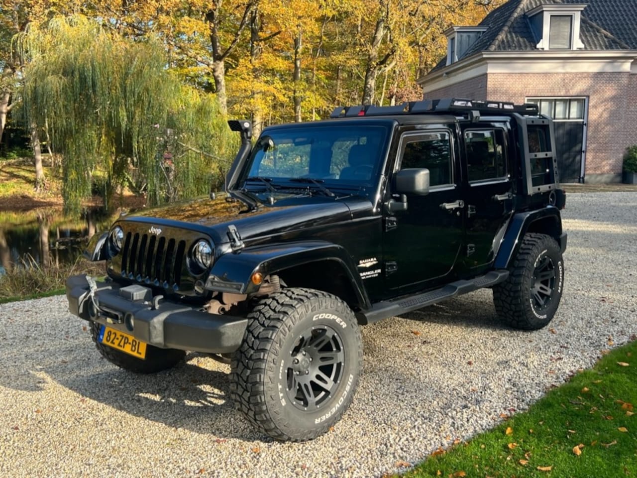 Jeep Wrangler - 3.8 SAHARA 5drs Aut. NL-auto VERHOOGD LIER #WOEST - AutoWereld.nl