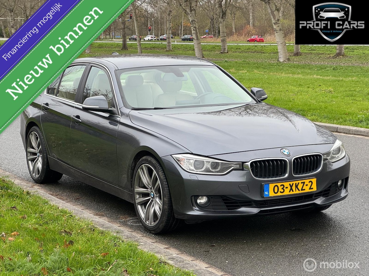 BMW 3-serie - 320i High Executive Cremeleer Navi Pdc Headup - AutoWereld.nl
