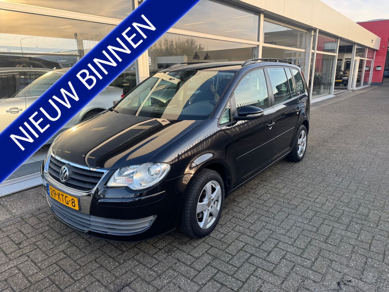Volkswagen Touran - 1.4 TSI Comfortline | 2e eigenaar | Airco |  Nieuwe distributie | Cruise control | Navigat - AutoWereld.nl