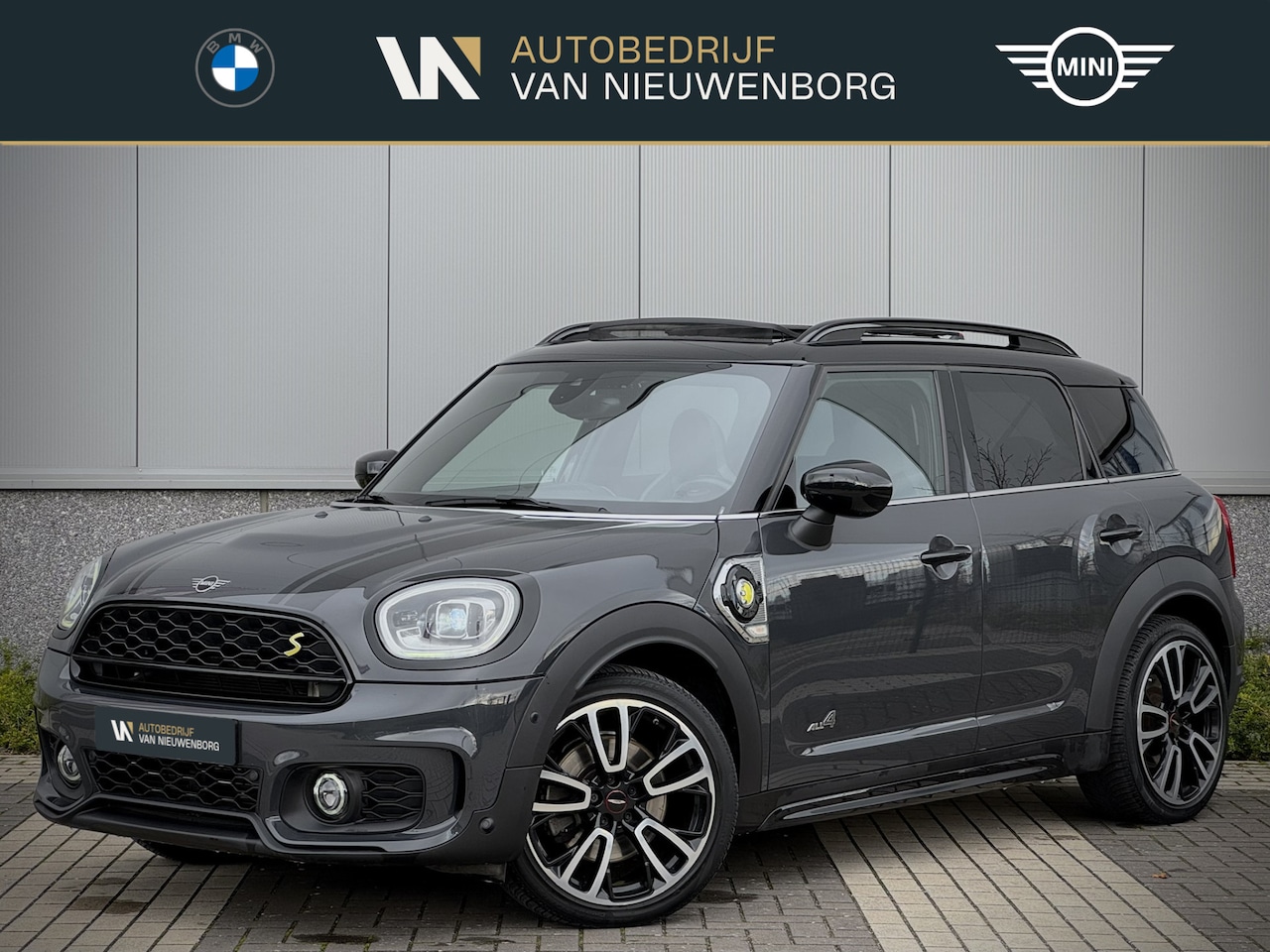 MINI Countryman - Mini 2.0 Cooper S E ALL4 John Cooper Works | JCW Sportstoelen | Panoramadak | Harman Kardo - AutoWereld.nl