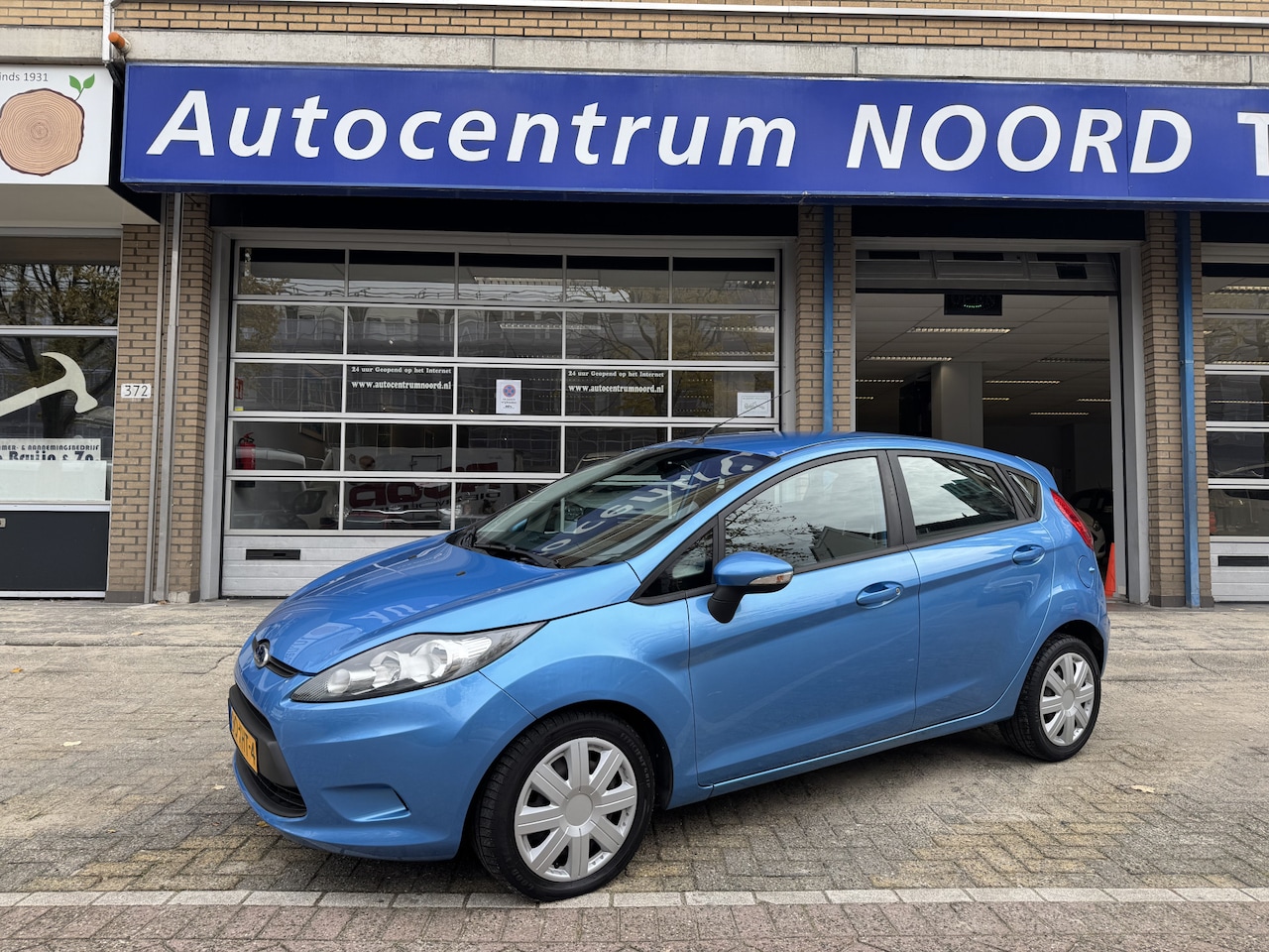 Ford Fiesta - 1.25 Champion 71369KM! NAP | Nieuwe Distributieriem |  1e Eigenaar | Apple Carplay | Airco - AutoWereld.nl
