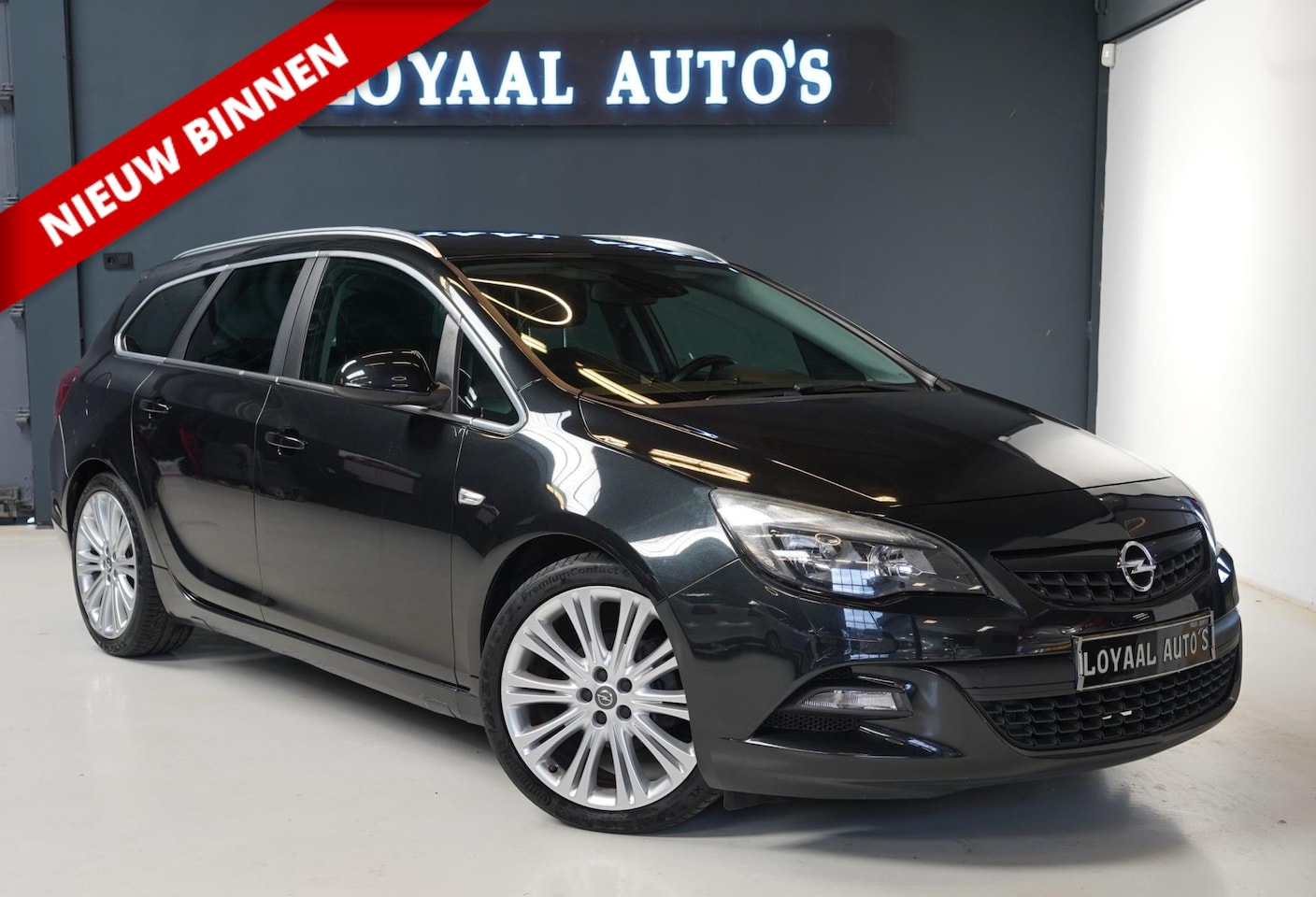 Opel Astra Sports Tourer - 1.4 Turbo Sport | AUT | CRUISE | AIRCO | PDC | NAP| APK. - AutoWereld.nl