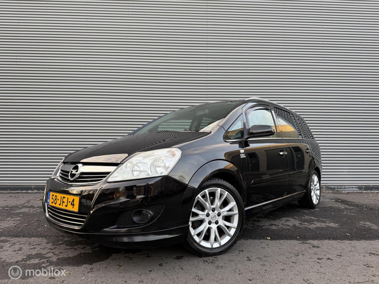 Opel Zafira - 2.2 Cosmo 7 Pers | Trekhaak | Climate Control | Cruise | Half leder | 17 inch LMV - AutoWereld.nl
