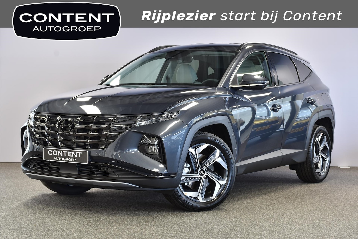 Hyundai Tucson - 1.6 T-GDi HEV 230pk Aut. Premium I Prachtig leder interieur. - AutoWereld.nl