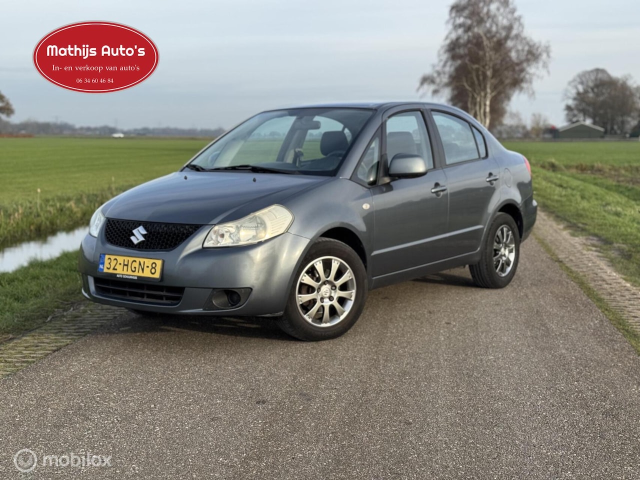 Suzuki SX4 - 1.6 Comfort Airco Sedan! - AutoWereld.nl