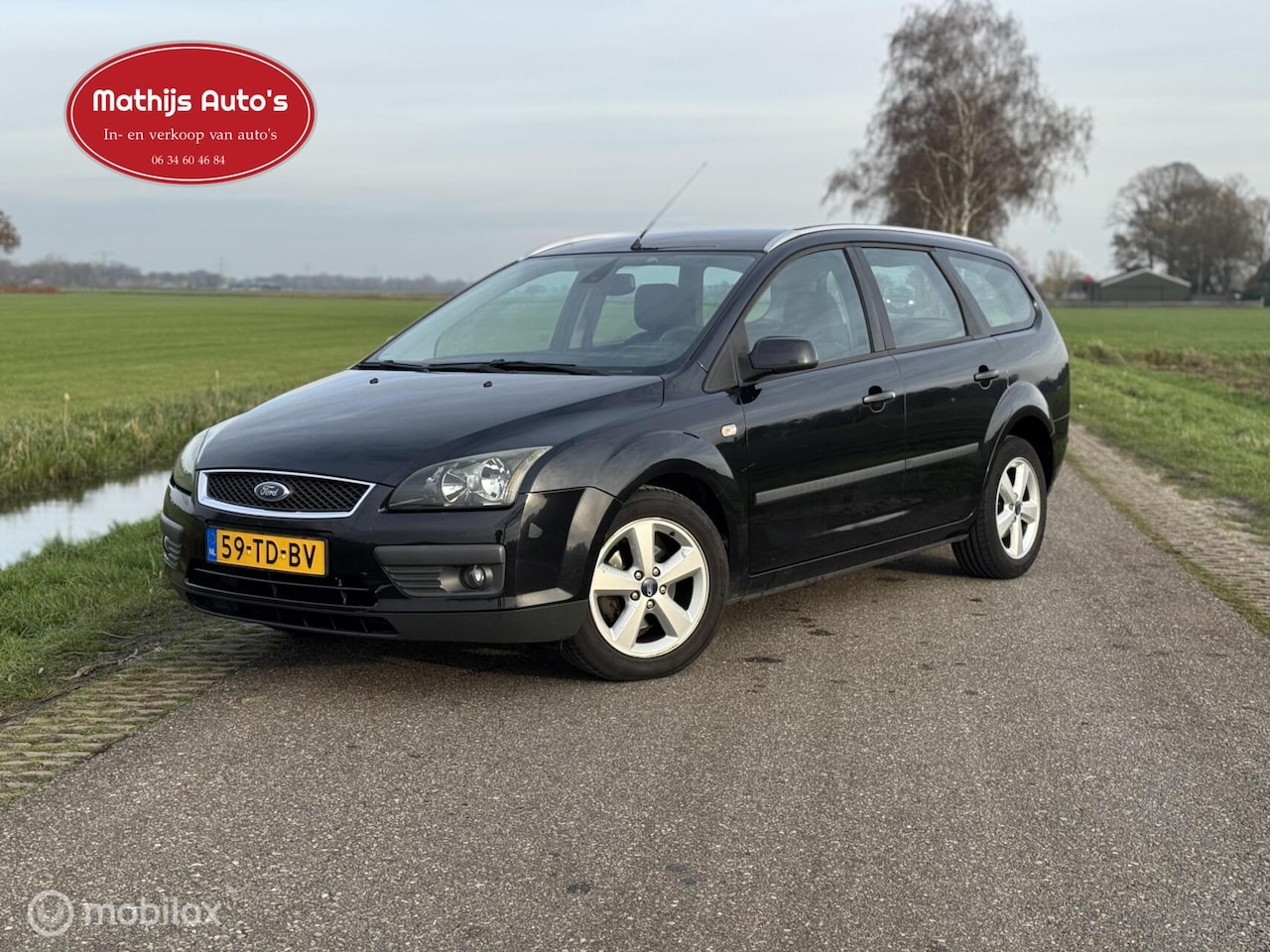 Ford Focus Wagon - 1.6-16V Ambiente Airco cruise Trekhaak! - AutoWereld.nl