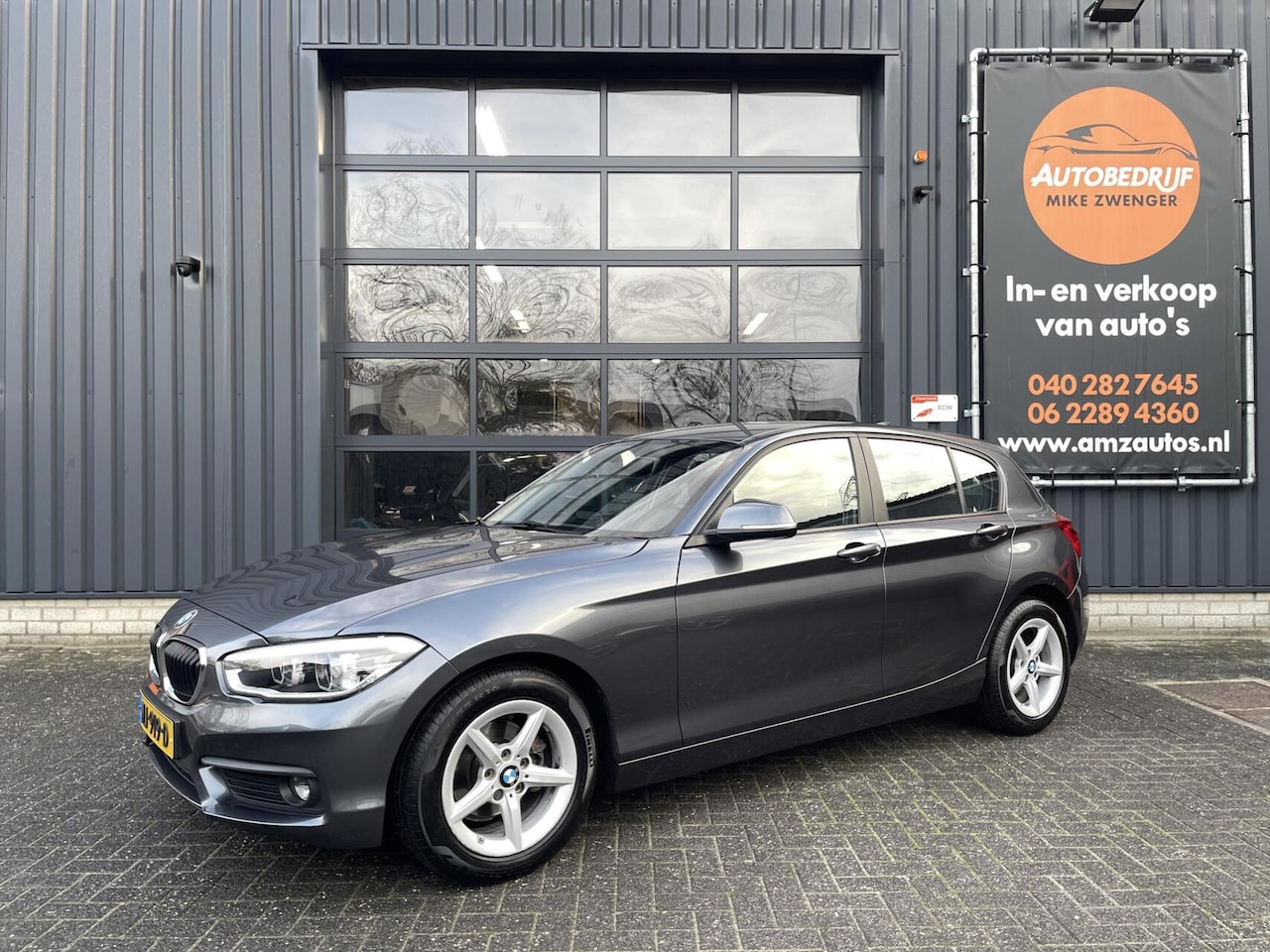BMW 1-serie - 118i Executive AUT. NAVIGATIE|1E EIGENARESSE |LED KOPLAMPEN|BLUETOOTH|CLIMA-AIRCO - AutoWereld.nl