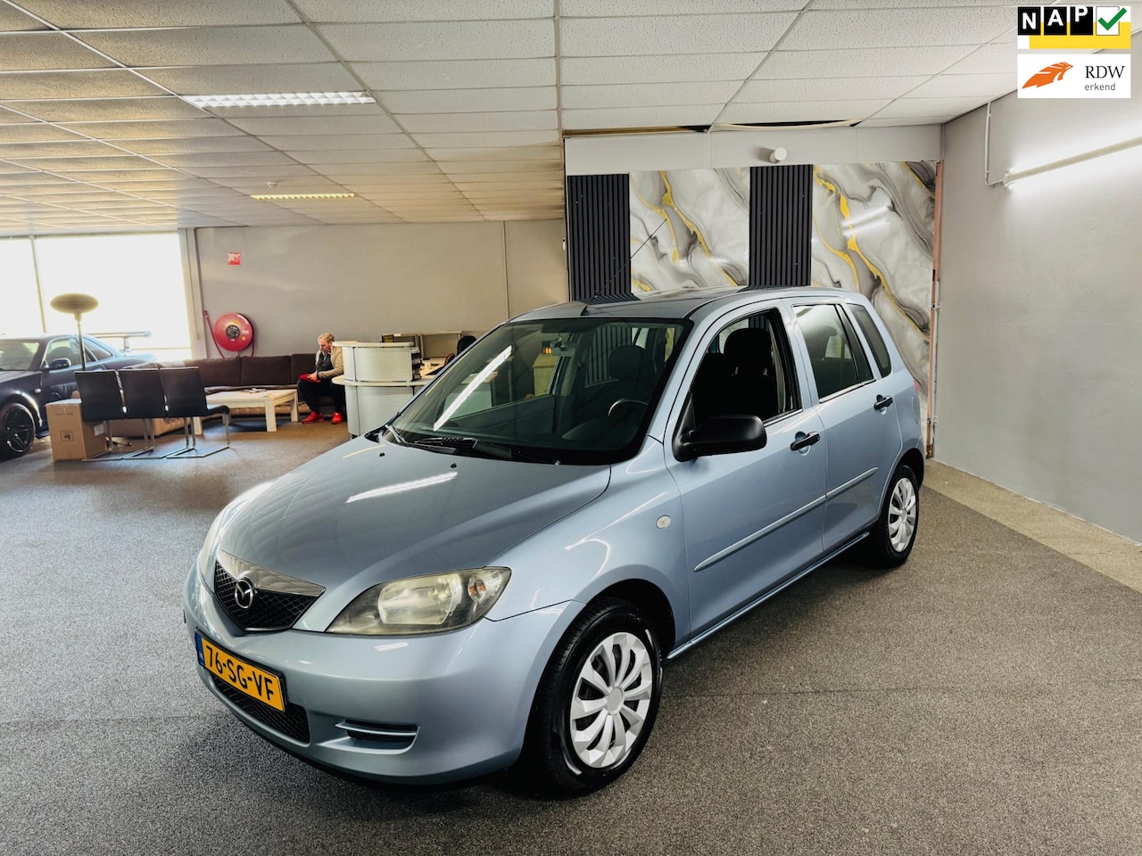 Mazda 2 - 1.4 Exclusive Apk Nieuw,Airco,E-Ramen,Trekhaak,N.A.P,Standkachel,2 sleutels + Boekjes,Tops - AutoWereld.nl