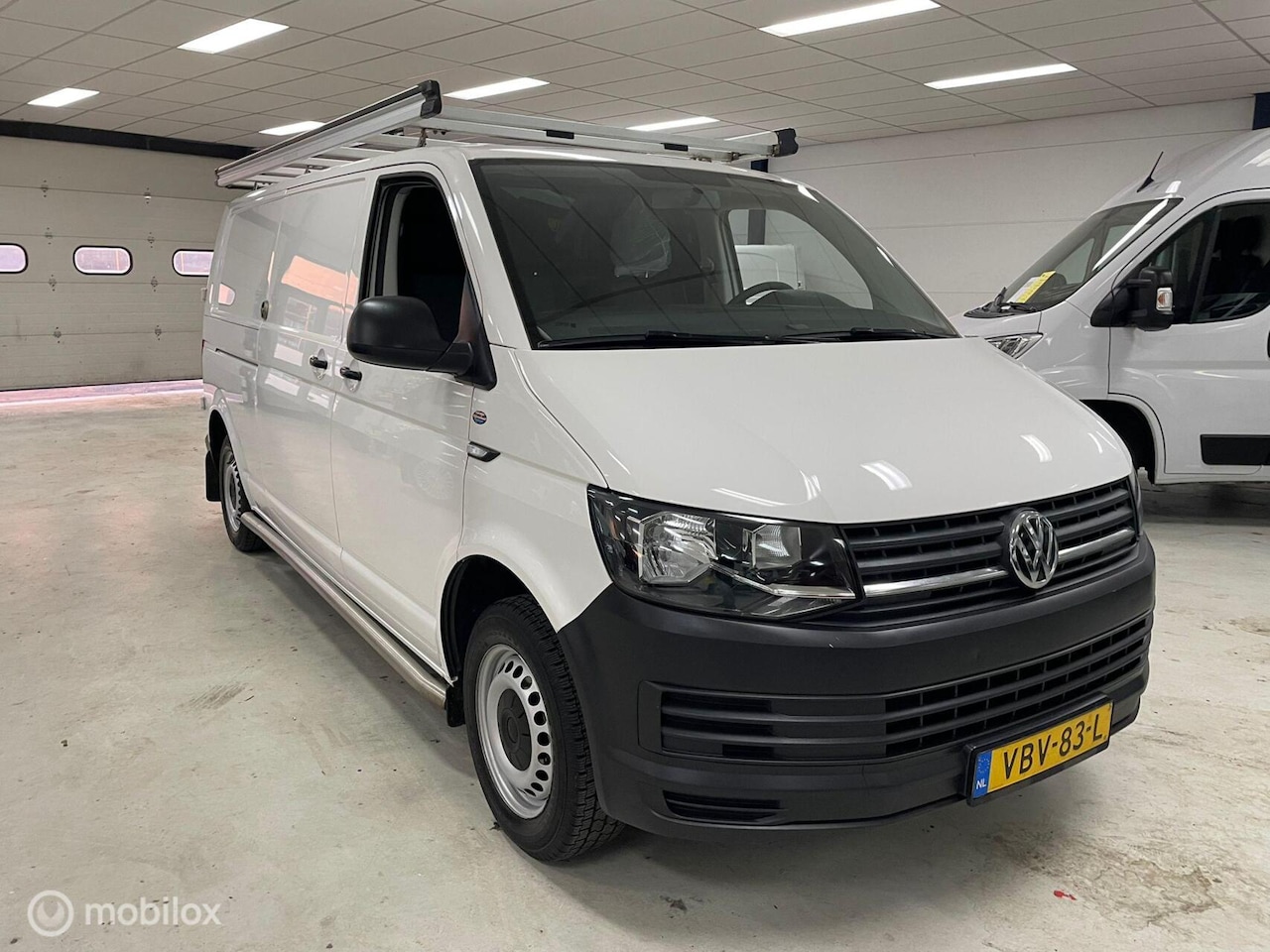 Volkswagen Transporter - 2.0 TDI L2H1 Airco Imperiaal Trekhaak - AutoWereld.nl