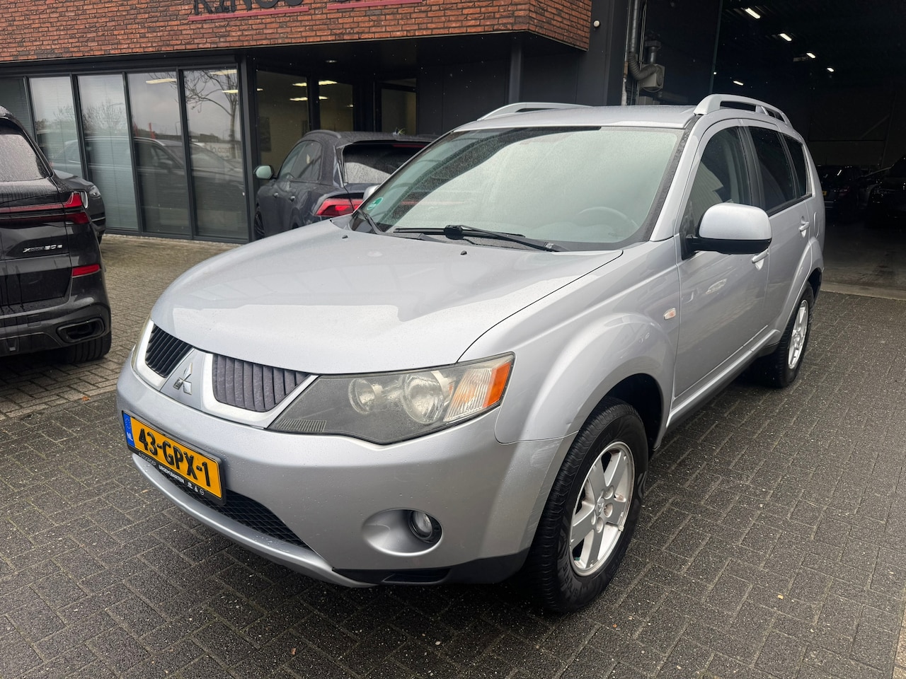 Mitsubishi Outlander - 2.4 Intro Edition 2WD AIRCO KOPPELING MATIG RIJDT GOED - AutoWereld.nl
