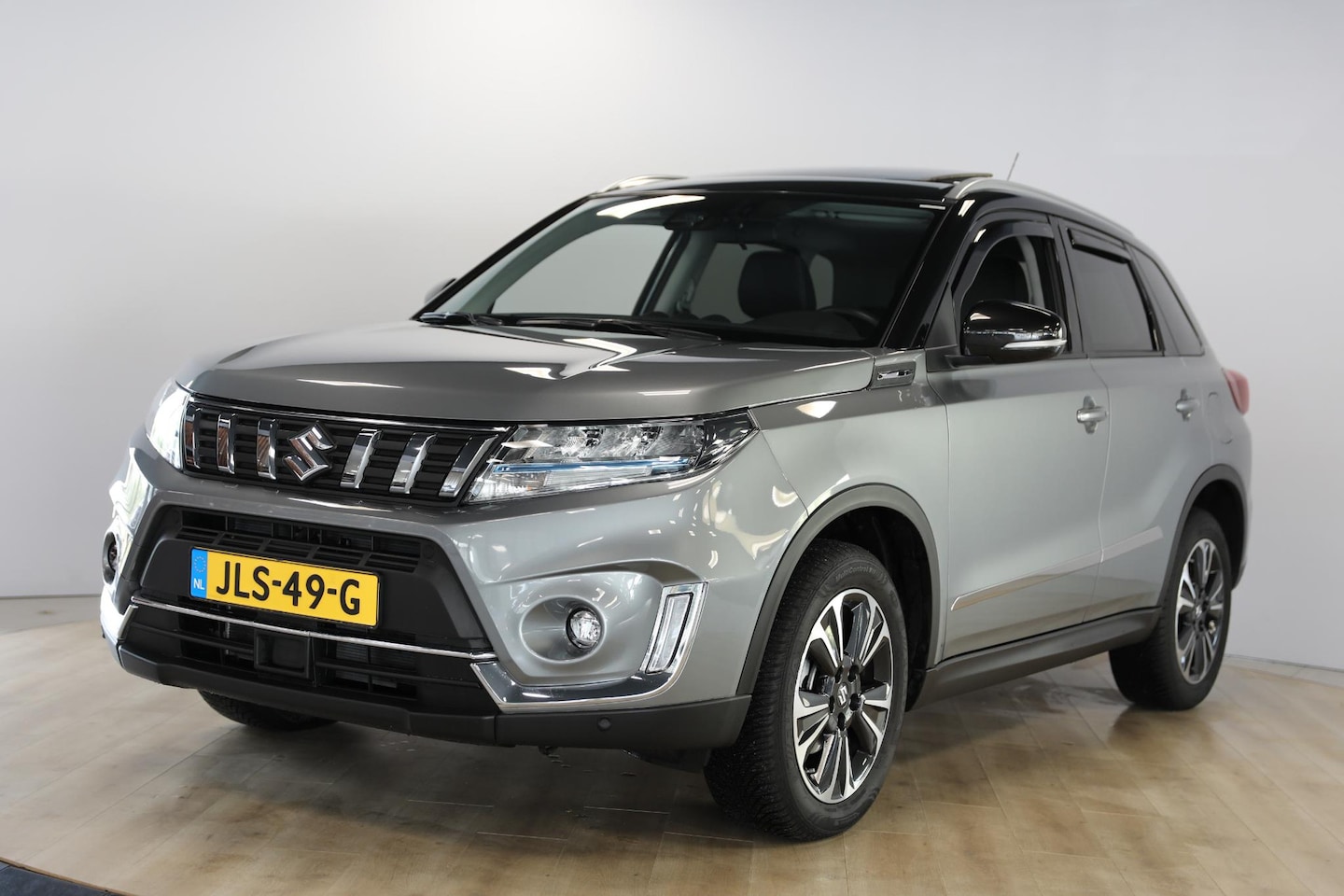 Suzuki Vitara - 1.5 Hybrid Style | Schuif- opendak | Camera | Trekhaak - AutoWereld.nl