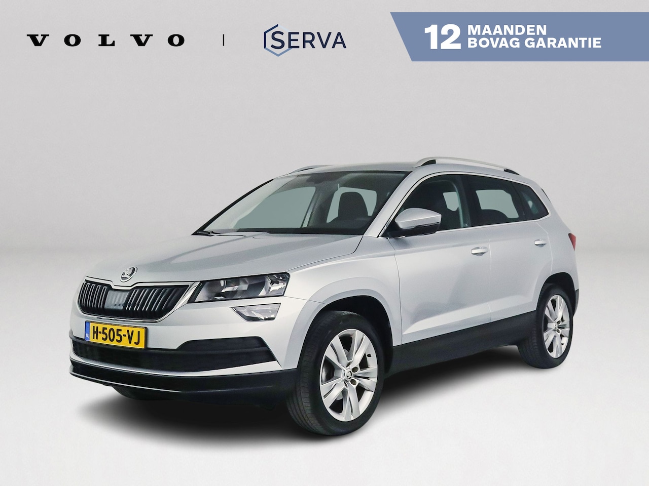 Skoda Karoq - 1.0 TSI Ambition Business Aut. | Stoelverwarming | Navigatie | Parkeersensoren | Extra get - AutoWereld.nl