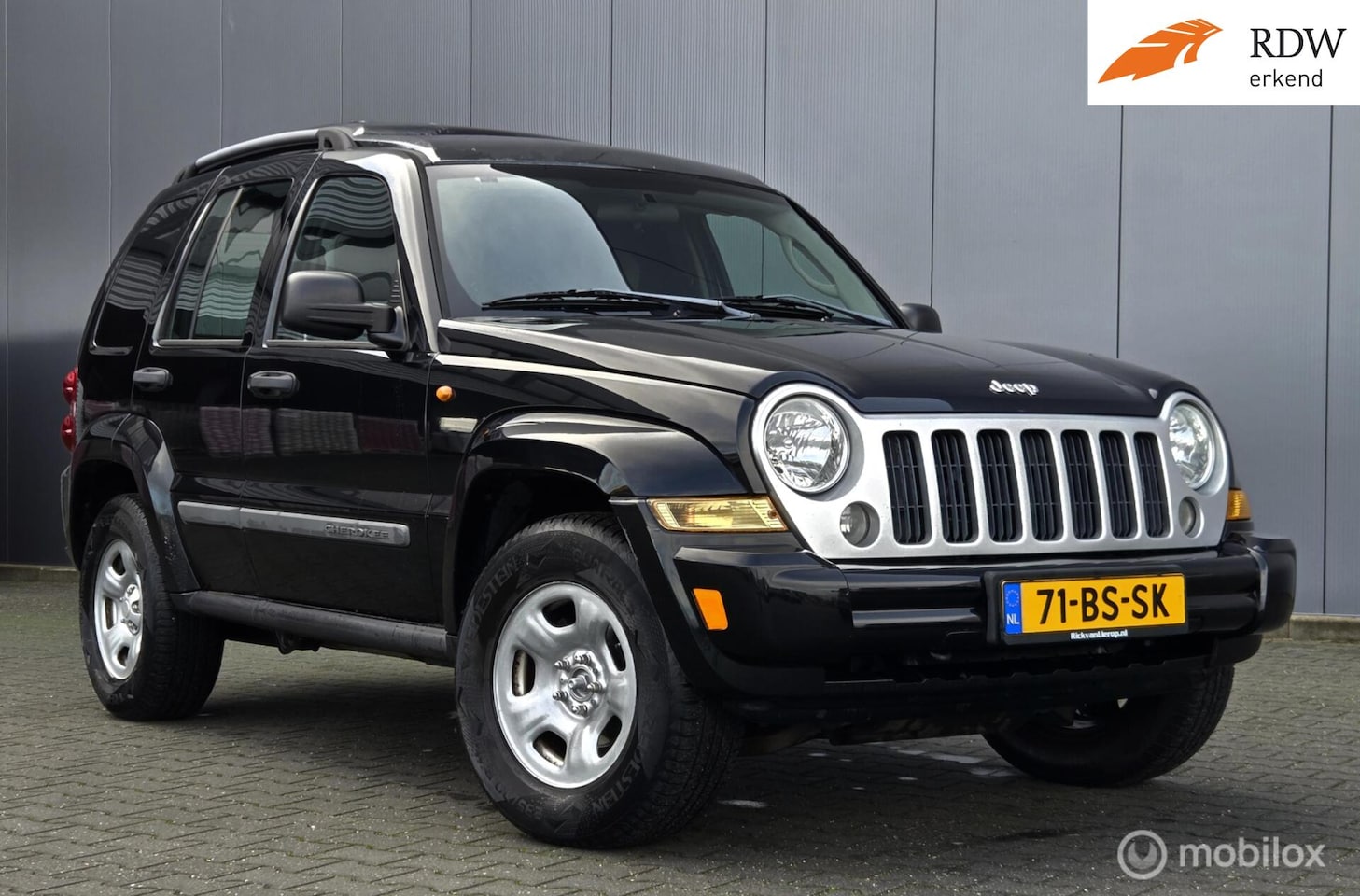 Jeep Cherokee - 2.8D Sport 4x4 Cruise Airco NAP grijs Kenteken - AutoWereld.nl