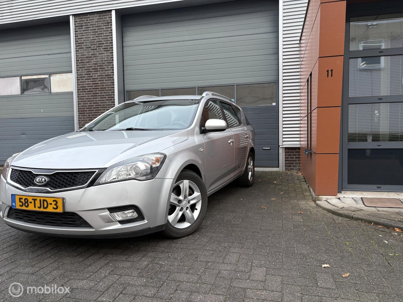 Kia Cee'd Sporty Wagon - 1.4 CVVT Navigator Plus Pack 1.4 CVVT Navigator Plus Pack - AutoWereld.nl