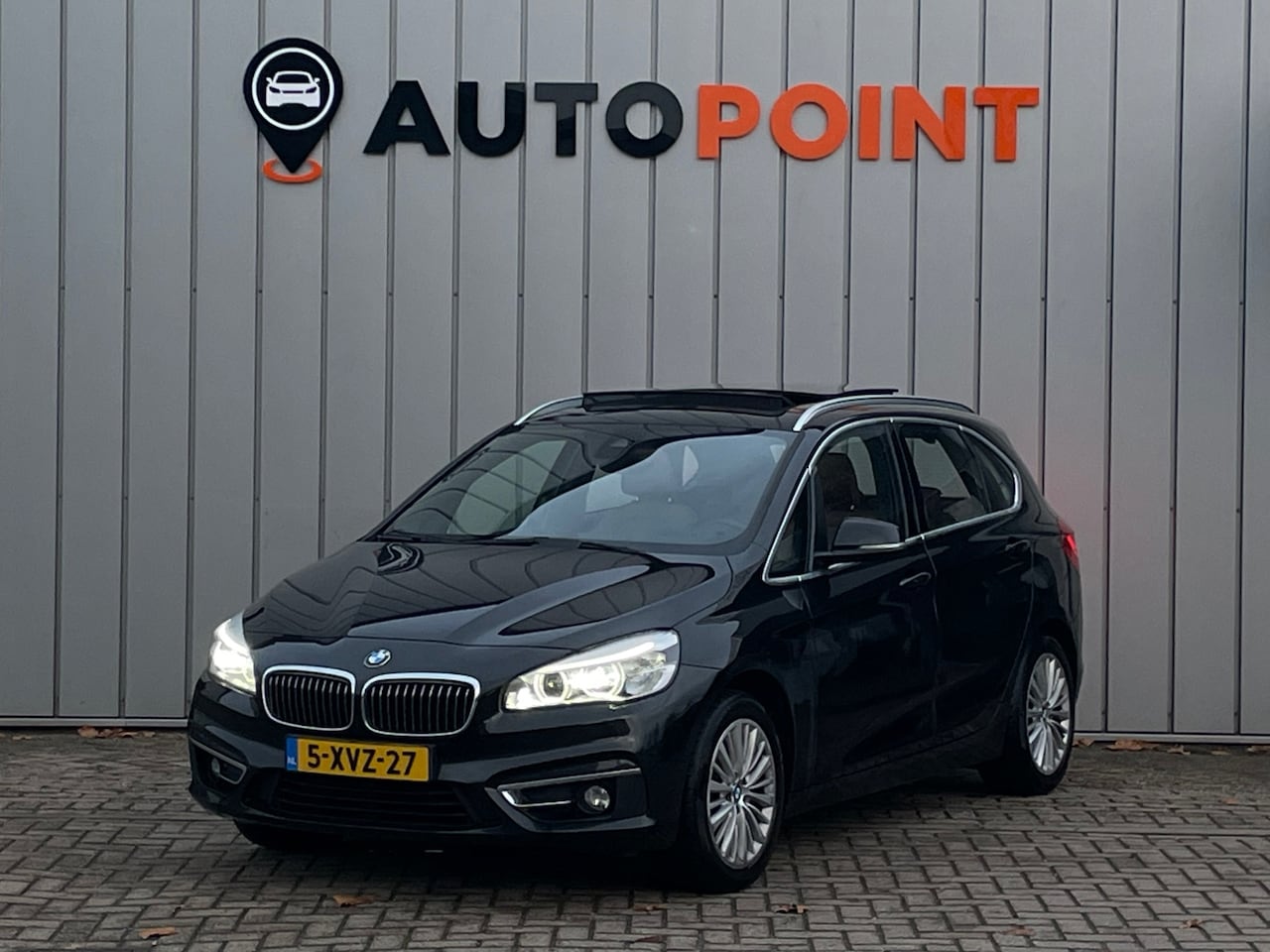 BMW 2-serie Active Tourer - 218i High Executive TREKHAAK LEER PANO - AutoWereld.nl
