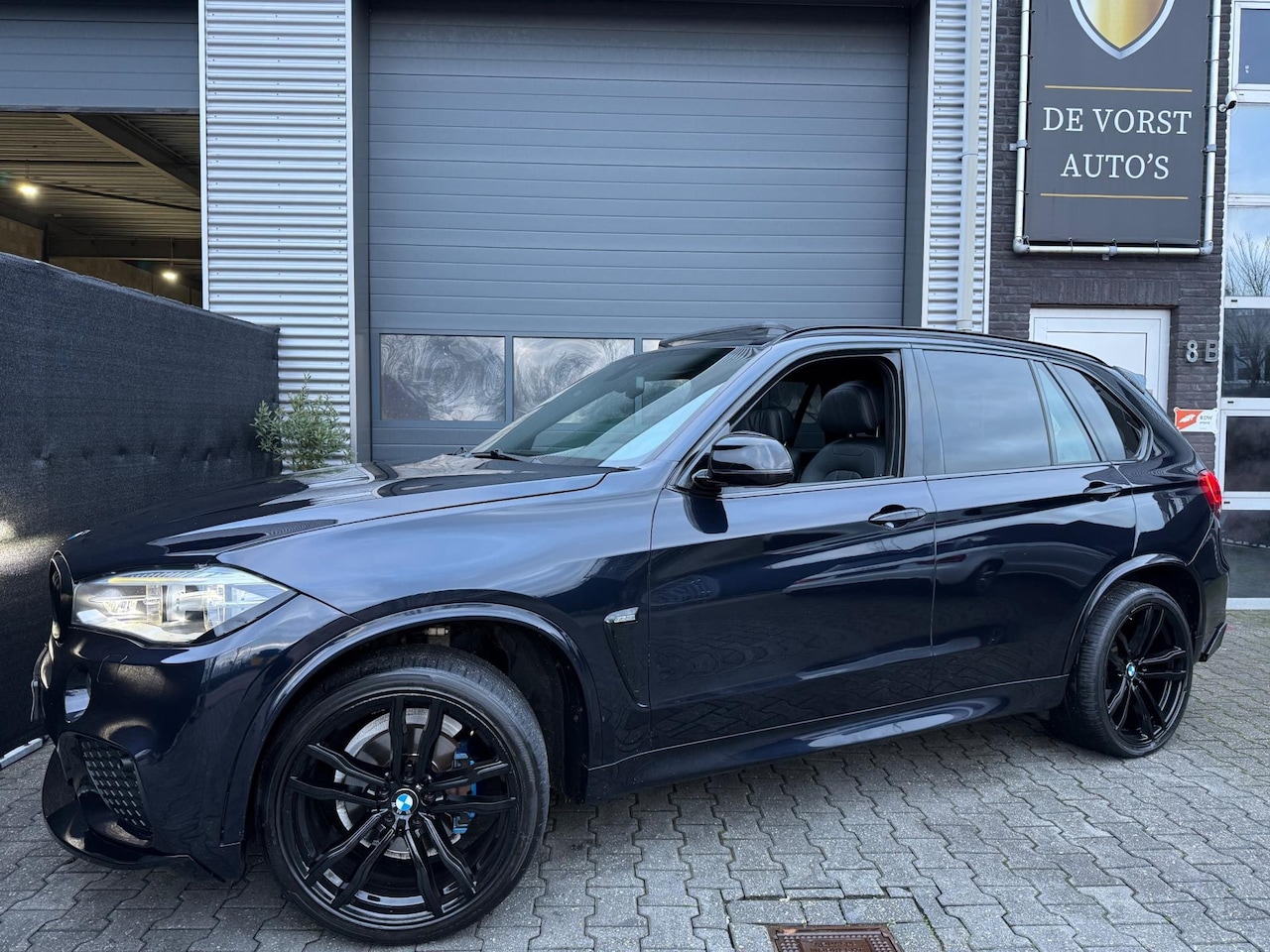 BMW X5 - M-Pakket | Carplay | Schuifdak | Head-UP - AutoWereld.nl