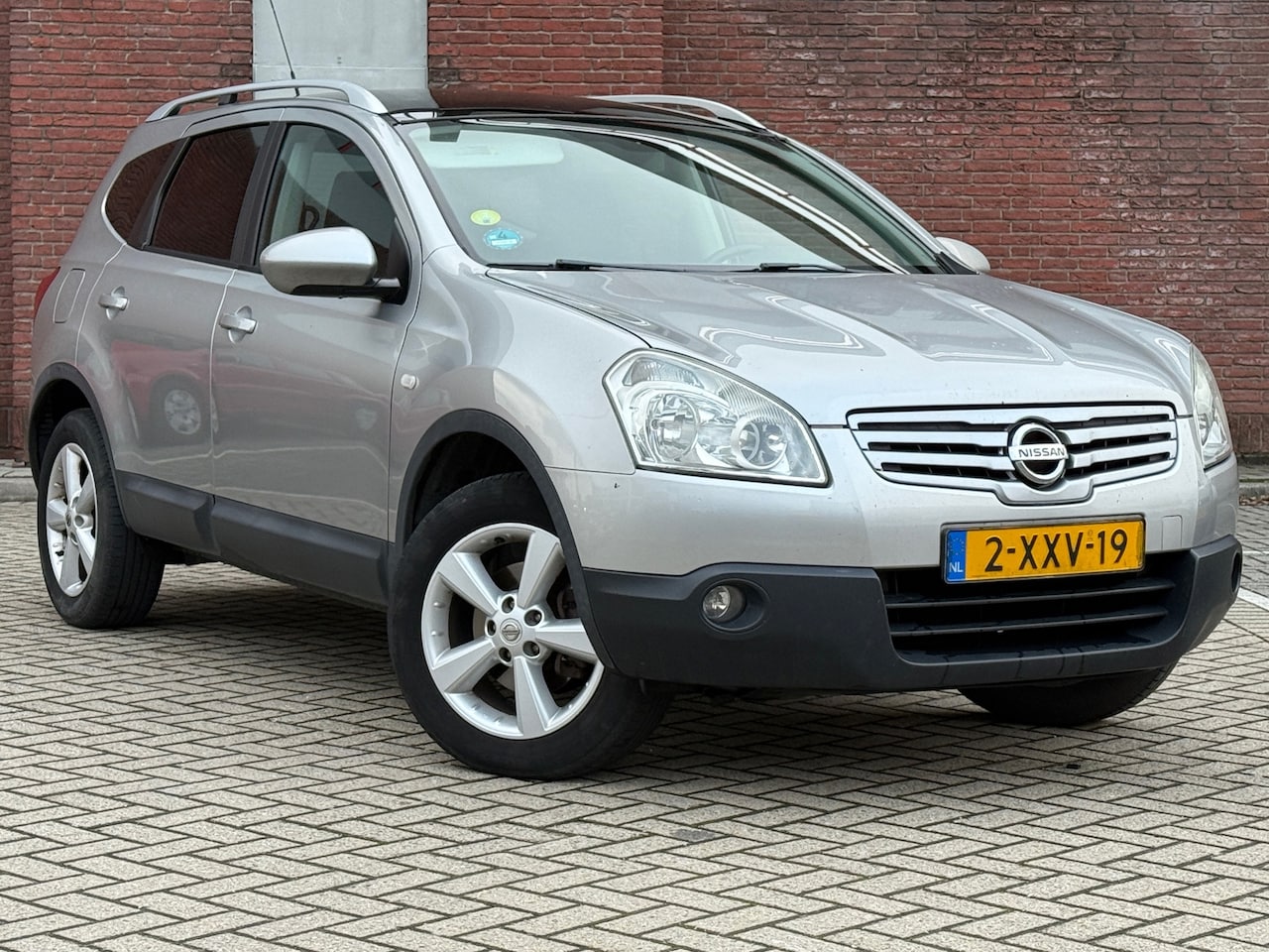 Nissan Qashqai+2 - 1.6 Visia|7P|PANNO|PDC|NAVI|CRUISE|APK - AutoWereld.nl