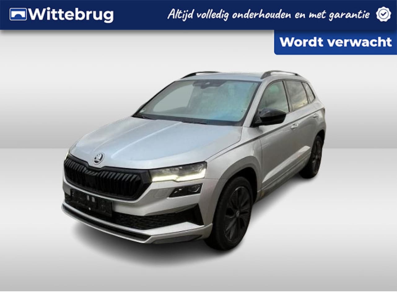Skoda Karoq - 1.5 TSI ACT DSG Sportline Business / Virtual cockpit / Stoelverwarming voor en achter / 18 - AutoWereld.nl