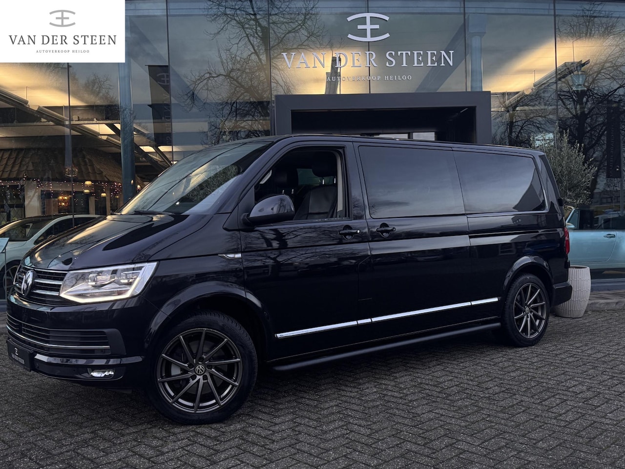 Volkswagen Transporter Caravelle - 2.0 TDI L2H1 DC 4Motion Highline Caravelle | 2x Elektr. schuifdeur | Schuifdak - AutoWereld.nl