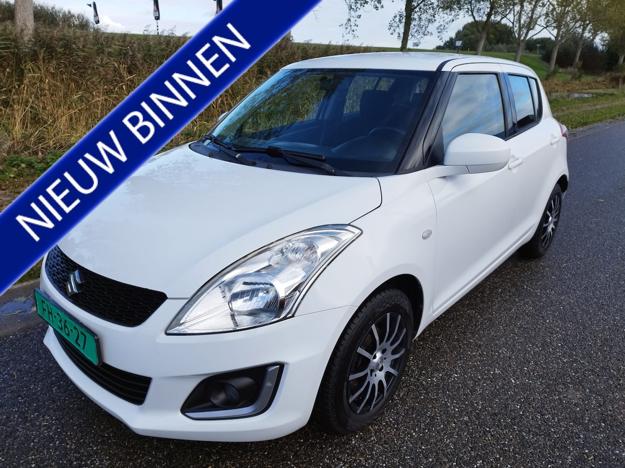 Suzuki Swift - 1.2 Comfort ** 118.847 KM ** Carplay ** 5 DRS ** NIEUWSTAAT ** - AutoWereld.nl
