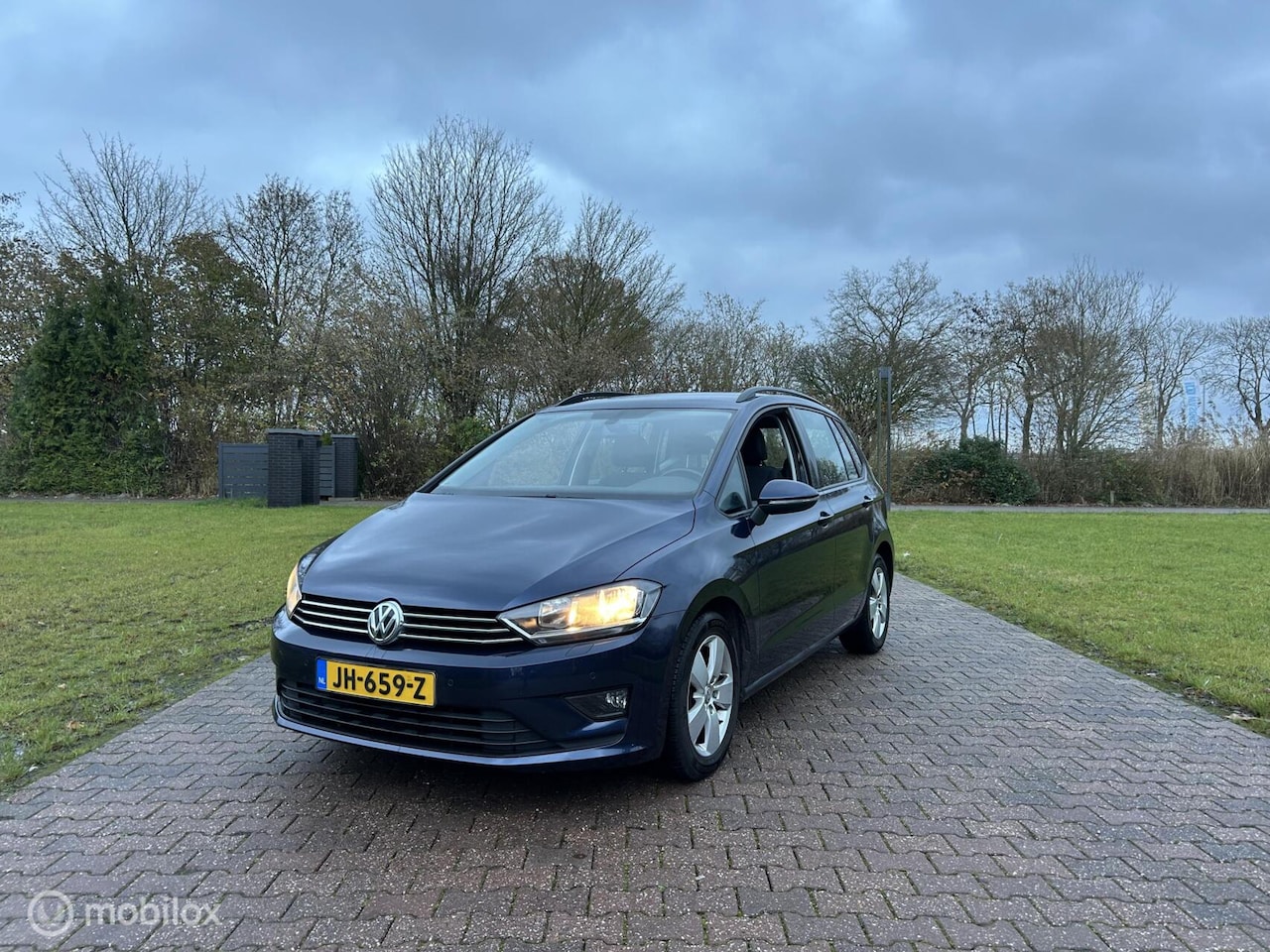 Volkswagen Golf Sportsvan - 1.4 TSI Highline 1.4 TSI Highline, Stoelverwarming - AutoWereld.nl