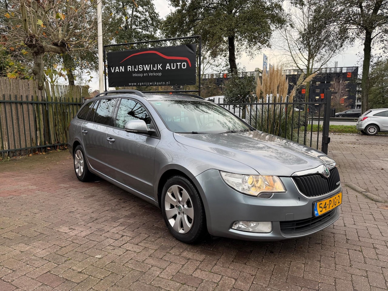 Skoda Superb Combi - 1.6 TDI Greenline Comfort Nav Cruise-con Pdc EX BPM - AutoWereld.nl
