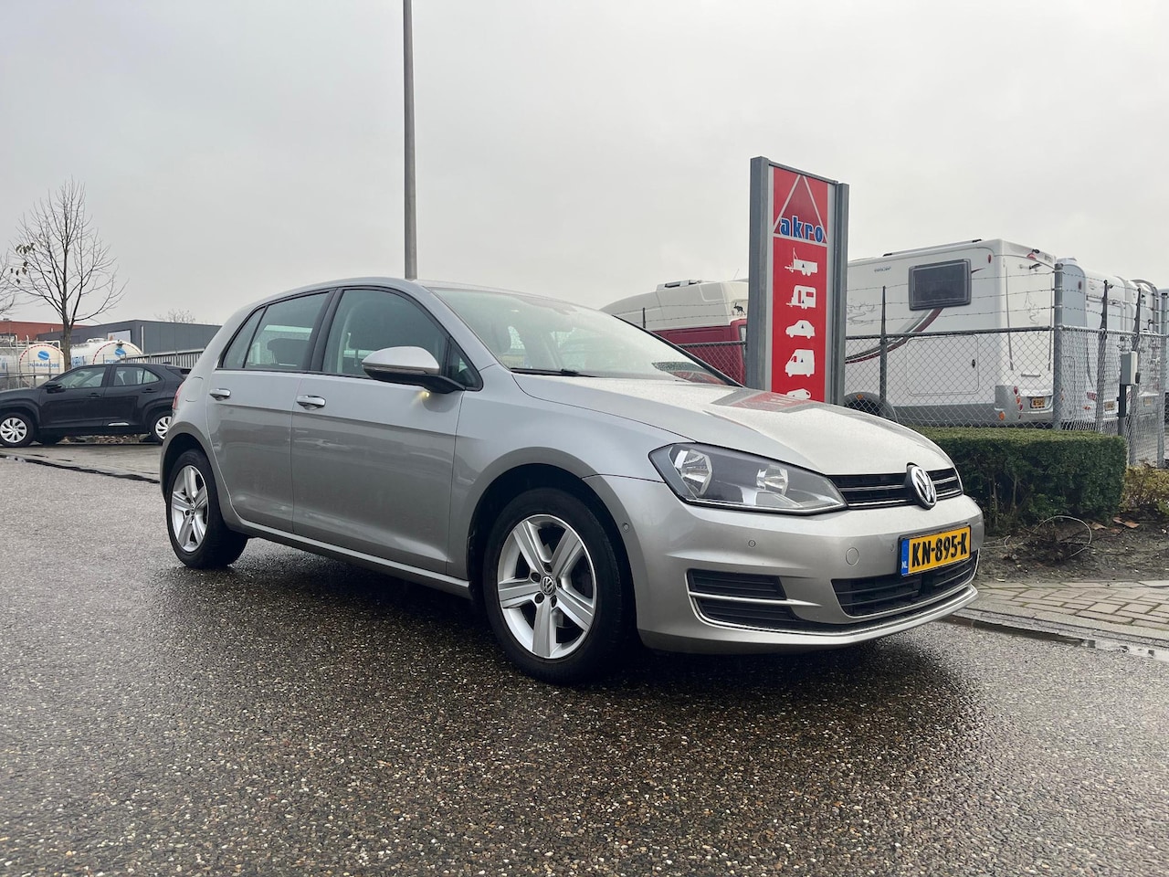 Volkswagen Golf - 1.6 TDI Highline | NAVI | Adaptive Cruise Control | Parkeersensoren voor en achter | Airco - AutoWereld.nl