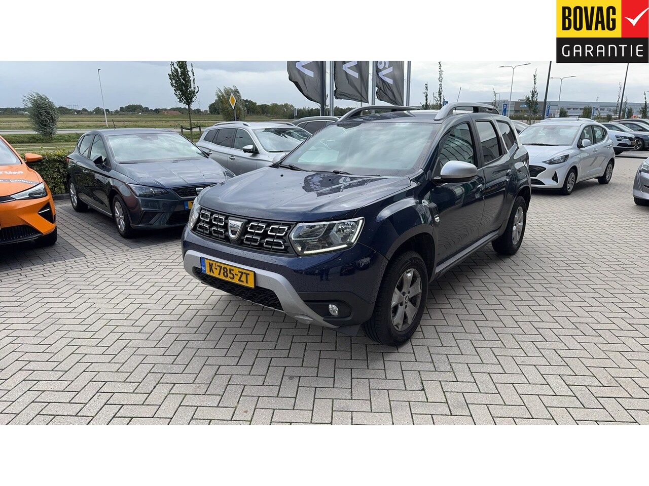 Dacia Duster - 1.0 TCe Bi-Fuel Comfort | 1E EIGENAAR | 12 MND GARANTIE | AIRCO | NAVI | CUIRSE |TREKHAAK - AutoWereld.nl