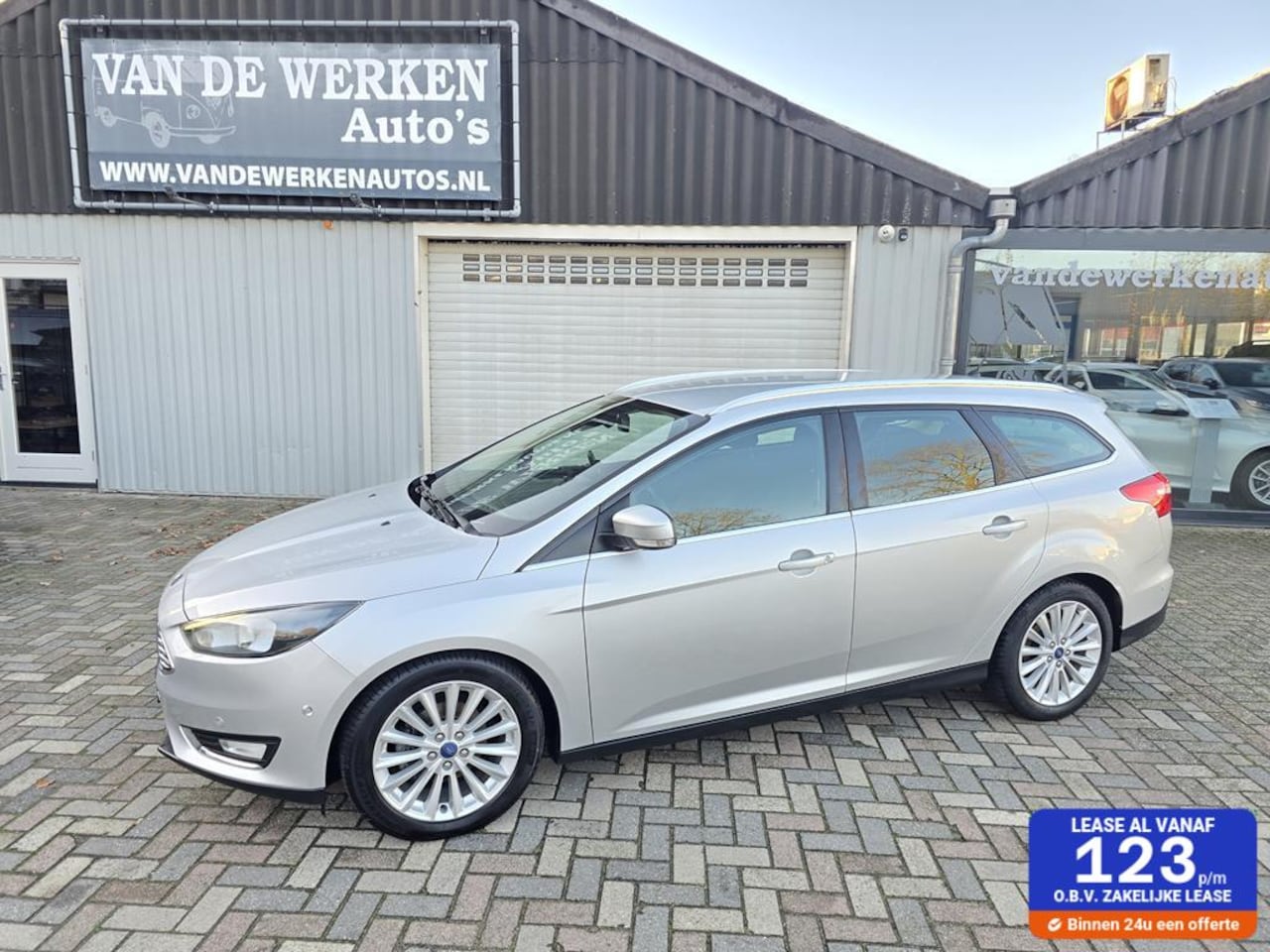 Ford Focus Wagon - 1.0 Titanium Clima|Navi|Cruise|Trekhaak|Nap!! - AutoWereld.nl