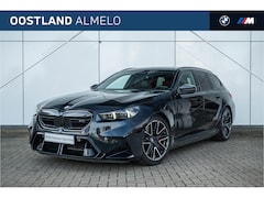 BMW 5-serie Touring - M5 Automaat / Panoramadak / Trekhaak / Stoelventilatie / Parking Assistant Professional /