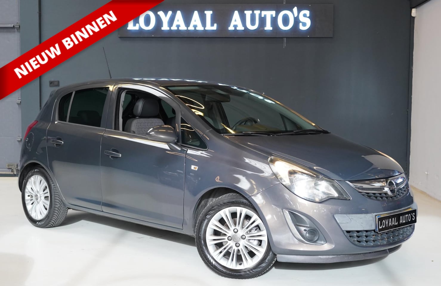 Opel Corsa - 1.2-16V Cosmo | AUT | NAVI | CRUISE | AIRCO | PDC | APK. - AutoWereld.nl