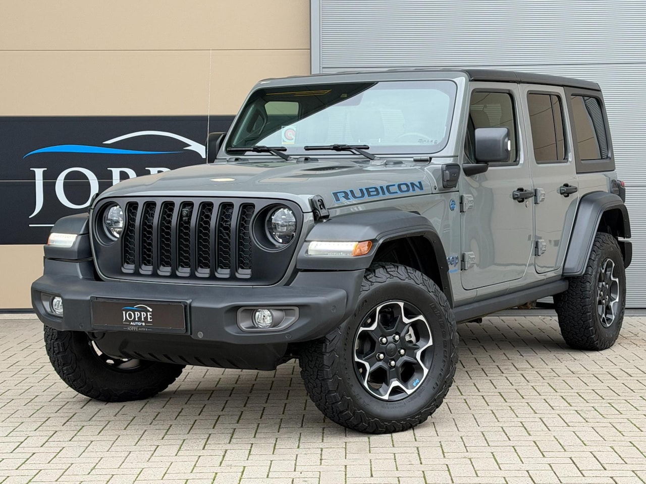 Jeep Wrangler Unlimited - 4xe 380 Rubicon|Trekhaak|Sting gray|Leder|Camera|Hardtop - AutoWereld.nl