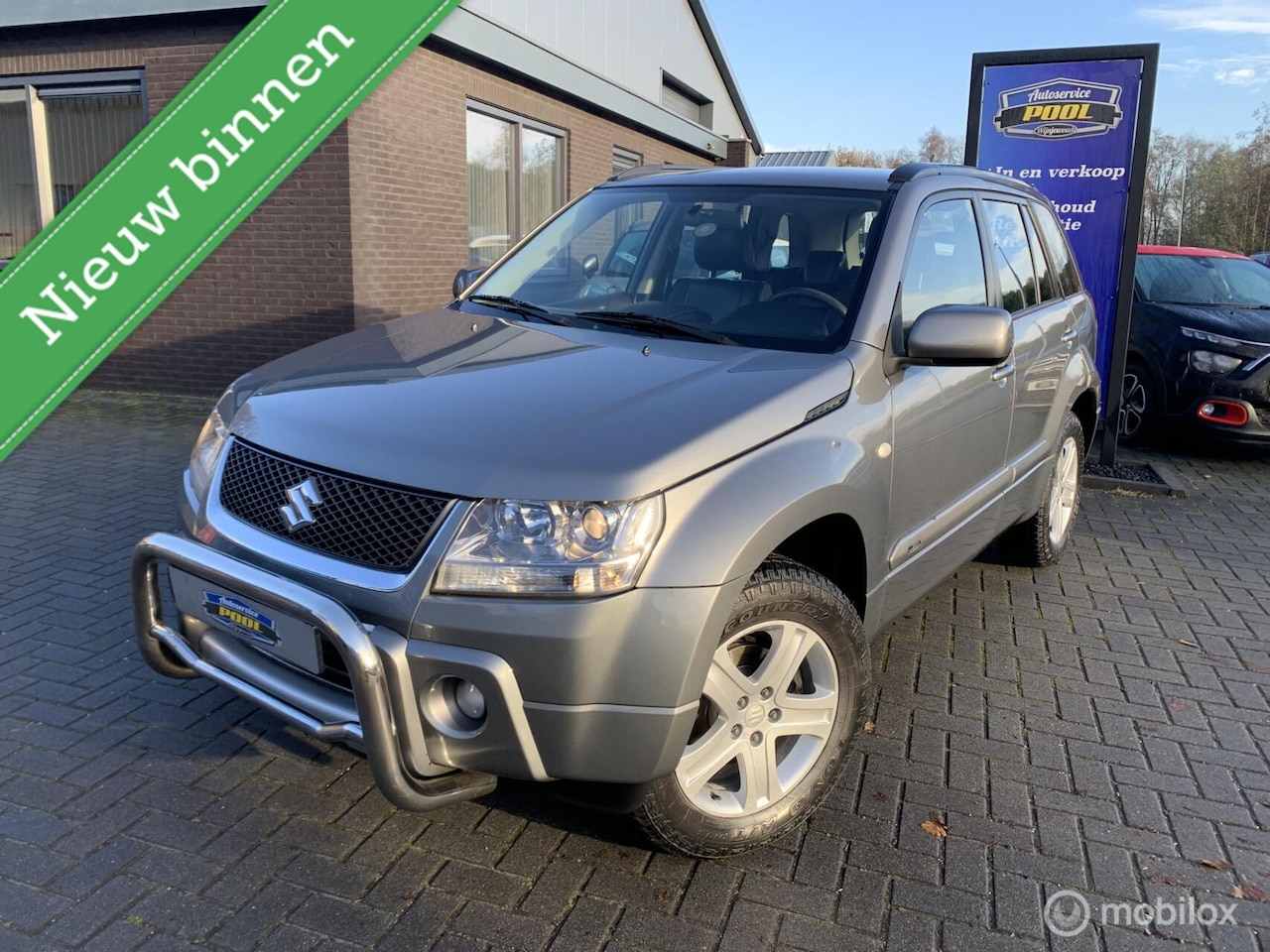 Suzuki Grand Vitara - 2.0-16V High Exective|Leer|Key-less|C/C - AutoWereld.nl